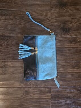 Turquoise and Black Leather Clutch Purse With Shoulder Strap And Wristlet.